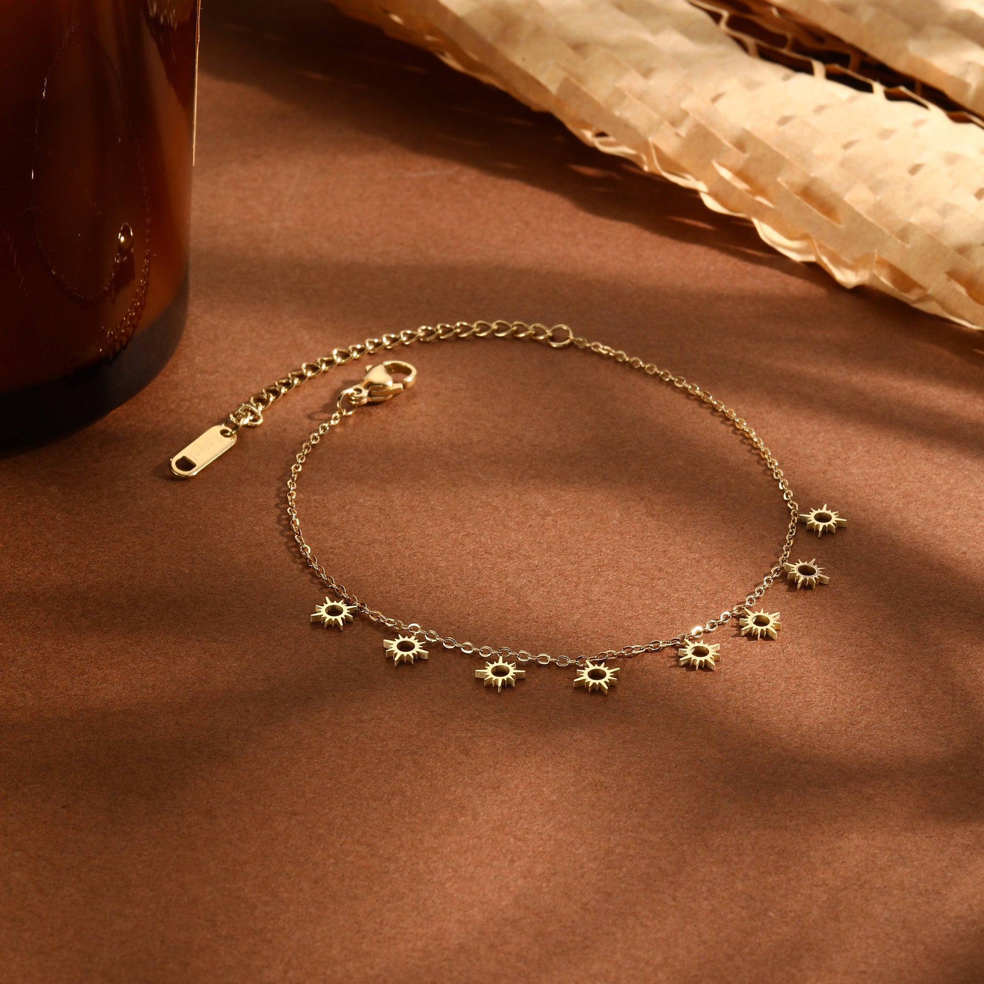 Goldkettenarmband mit Mini-Sonnenanhängern