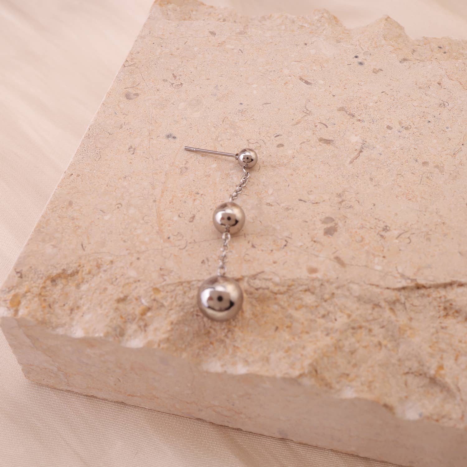 Dreifache Kugelohrringe aus Silber