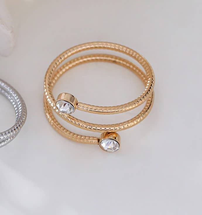 Goldener Spiralring mit doppeltem Strassstein